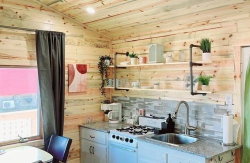 Alexandria Cabin | Modern lakeside cabin with panoramic views and deck.