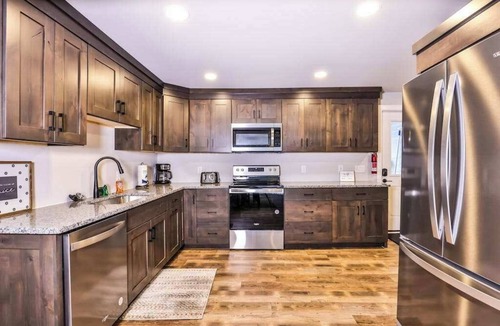 Manitowish Waters House | Nature retreat & cabin on snowmobile trails with firepit - dogs ok