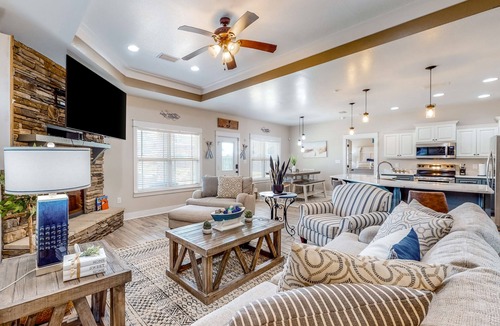 Crestview House | Nautical-themed retreat with a saltwater pool, fire table, full kitchen, and AC