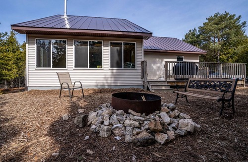 Gills Rock House | * New home w/ wood fireplace, tucked in peaceful woods centrally located !