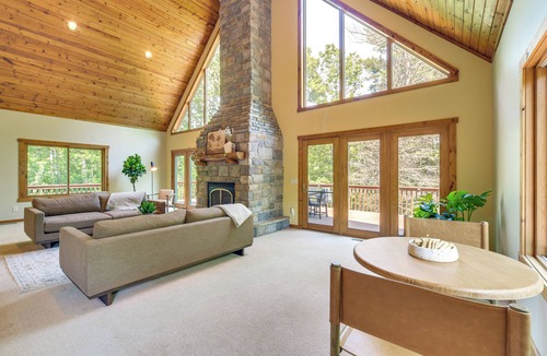 Amery House | New Listing! Timber Ridge Lake House is a private home in Amery Wisconsin on Lake Wapogasset/Bear Trap. The home balances the warmth of a large A-Frame with modern decor and finishes providing a serene stay with woods and lake views.