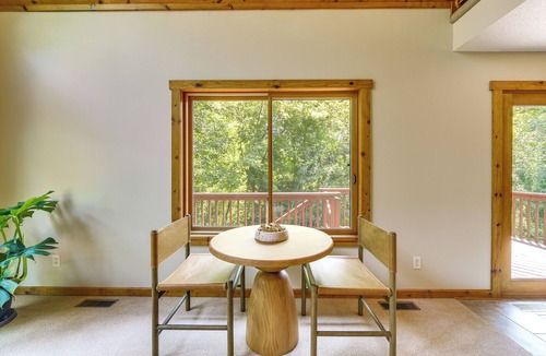 Amery House | New Listing! Timber Ridge Lake House is a private home in Amery Wisconsin on Lake Wapogasset/Bear Trap. The home balances the warmth of a large A-Frame with modern decor and finishes providing a serene stay with woods and lake views.