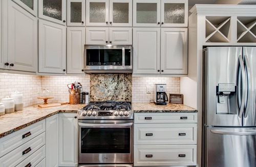 Eagle River Condo | Newly-built condo on Duck Lake with decks, private dock, & firepit
