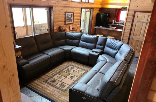 New Lisbon Cabin | Northwoods Getaway- Private swimming pond, hot tub, & 70 acres of woods