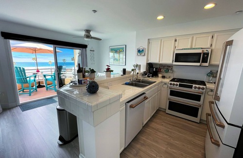 Townsite Condo | OCEANSIDE OASIS: Beach Front - Breathtaking Ocean, Pier, Strand, & Sunset Views