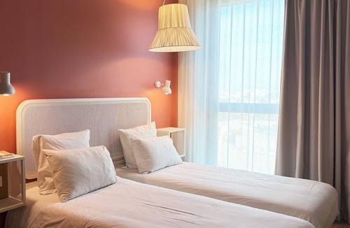 Quartier du Pont-de-Flandre Hotel | OKKO Hotels Paris Rosa Parks