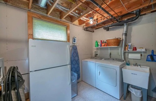 Land O Lakes Cabin | Otter Point Lodge - 4BR, 3BA 1100ft water frontage log home w/2 docks & firepit