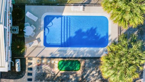 Surf Side Shores House | Our Serenity Now with Private Pickleball & Pool