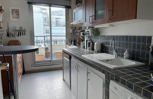 Montparnasse Apartment | Panoramic view of Paris and Montparnasse Station