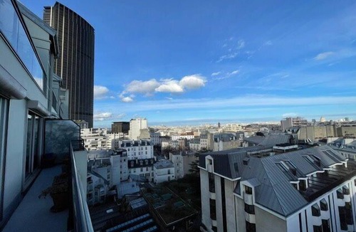 Montparnasse Apartment | Panoramic view of Paris and Montparnasse Station