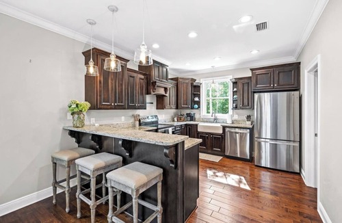 Fairhope House | Perfect for families celebrating July 4th! Have a great time on the River with big porch and pier on the water!