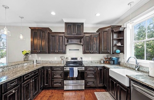Fairhope House | Perfect for families celebrating July 4th! Have a great time on the River with big porch and pier on the water!