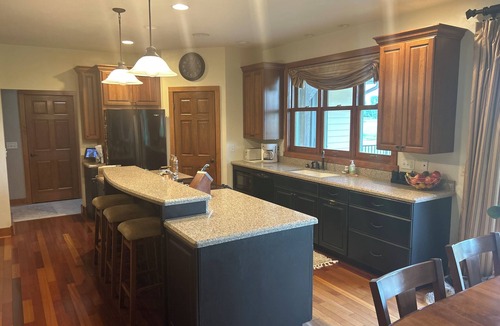 Black Wolf House | Prime EAA Location! 3BR/3BA Rental – South Side - 3 Miles to Grounds
