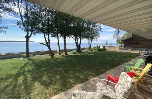 Little Sturgeon House | Prime sunsets, great kayaking, huge yard, volleyball court, and free firewood