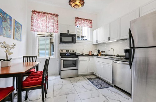 Freret Villa | Prime Uptown Villa with Backyard and EV Parking