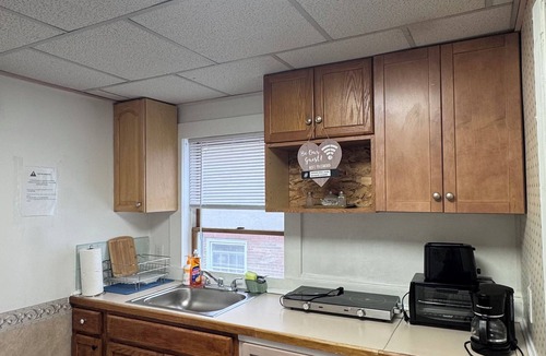 Malden Apartment | Private 1BR Near Boston — Kitchen & Laundry