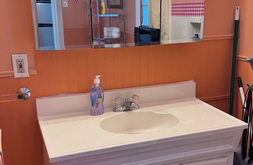 Malden Apartment | Private 1BR Near Boston — Kitchen & Laundry