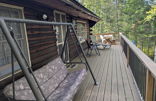 Outing Cabin | Private, cozy 4-bedroom log cabin with 374 feet of lakeshore on Washburn Lake!