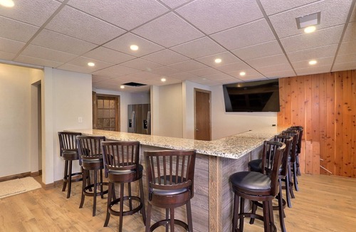 Three Lakes House | Private waterfront lake, sand beach, bar that seats 12, game room,