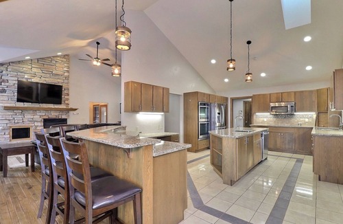 Three Lakes House | Private waterfront lake, sand beach, bar that seats 12, game room,