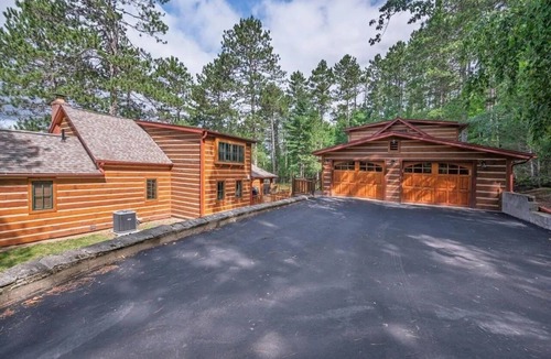 Land O Lakes House | Rare & Private Lake retreat features two separate homes, sandy beach