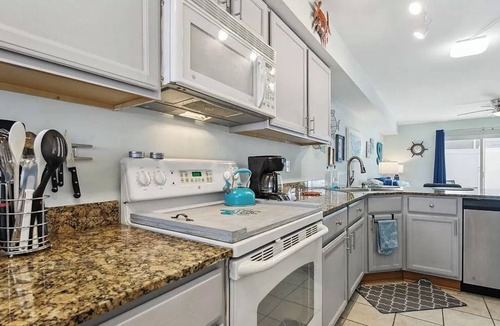 Biloxi Condo | Relax with the whole family just across from Biloxi Beach.