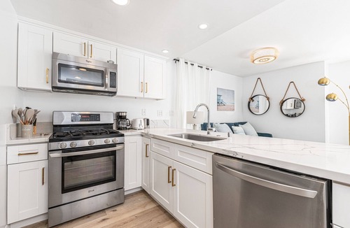 West Newport House | Remodeled 7BR Home w/Stylish Interior, Only Steps to Sand!