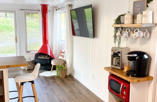 East Dubuque Apartment | Retro floating cabin on river backwaters. HOT TUB!