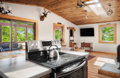 Great Cacapon Cabin | River Cabin w/hot tub, fire pit, deck, games, wifi