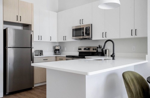 Lower Washington - Mount Hope Apartment | Roomy Roslindale 2BR w/Gym & W/D, walk to T stop, by Blueground