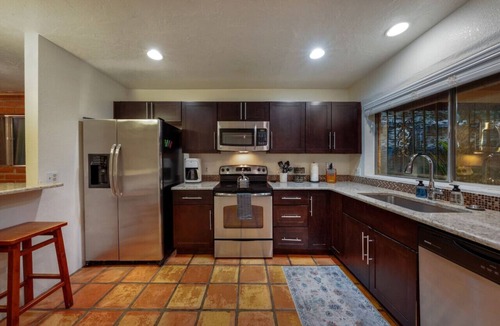 Sam Hughes House | Sam HughesA/3 BR 2 B/U of A/Fenced/Carport