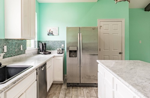Ocean Springs House | Sassy Seas 2BR Cottage near Ocean Springs: Gulf Views, w/Balcony & Fire Pit
