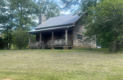 Utica Cabin | Secluded getaway cabin on 50 acres in the beautiful woods of Utica, MS.