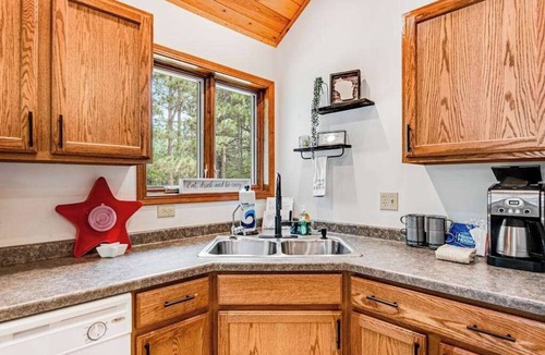 Nekoosa House | Secluded lake retreat with game room; near beach, boat rental, dining, and golf