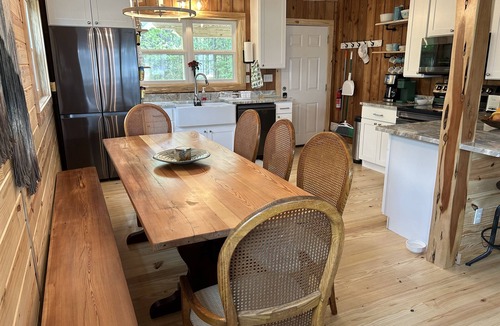 Alabama Gulf Coast Cabin | Secluded waterfront fishing cabin, boat dock, pier, sunsets, boat to beach