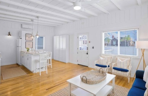 West Newport House | Second-story beach cottage with a furnished deck, AC, W/D, & garage parking