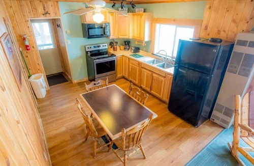 Puposky Cabin | Serene Lakefront Cabin - Steps from Big Turtle Lake