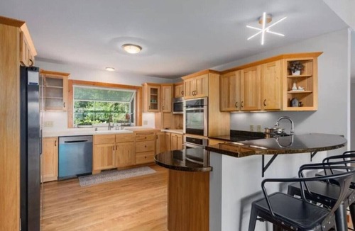 Altoona House | Spacious Home on Lake Altoona- Firepit, Theater, Gym