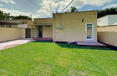 North Long Beach House | Spanish-Style Northside Gem | 2 Dog-Friendly Yards & Alfresco Dining