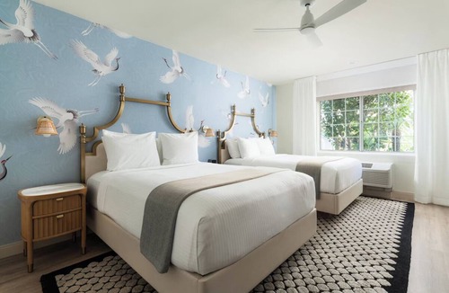 West Beach Hotel | Steps from the Beach! Relaxing Queen Stay w/Coastal Courtyards, Bikes & Pool!