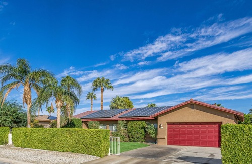 Racquet Club West House | Stylish, dog-friendly home with private pool, pool spa, enclosed yard & grill