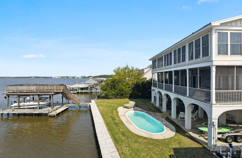 Pass Christian House | Sunsets on the bay with private pool and sunporch/screenporch