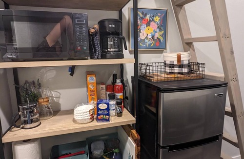 Sam Hughes Apartment | Tiny house with loft bed, kitchenette, parking in a quiet downtown neighborhood