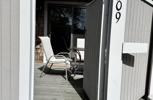 Hyannis House | Townhouse less than one-minute walk to a private beach and heated pool on site