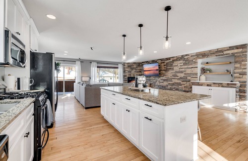 Brooklyn Center House | Twin Cities Retreat - Hot tub, Pool, Games and more