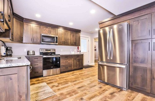 Manitowish Waters House | Updated, tree-lined home on the snowmobile trail with gas fireplace & firepit