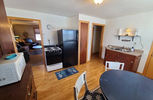 Algoma House | Upper River House Waterfront Getaway on Ahnapee River with Dock Boat Slip Wifi