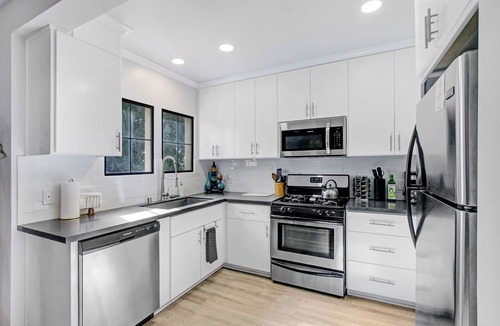 Panorama City House | Velvet and Brass Cozy Four Bedroom Poolside & Hot Tub Retreat