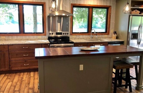 Plymouth House | Walk to Road America Races. Enjoy the lake frontage and fishing and kayaking.