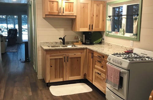 Menahga Cabin | Waterfront Cottage, swim, paddle, fish and relax on your private dock.